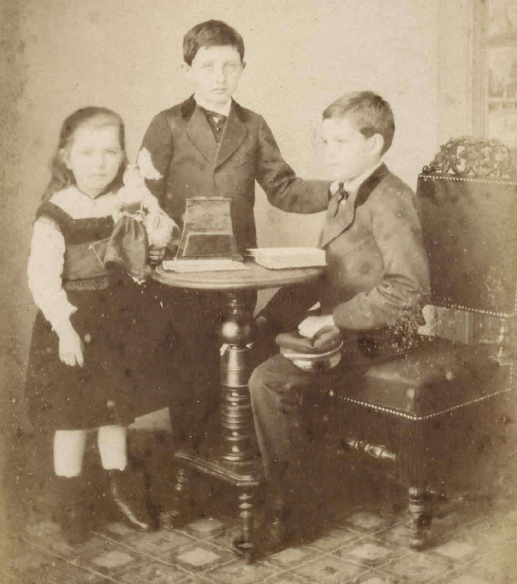 Three children and a stereoscope